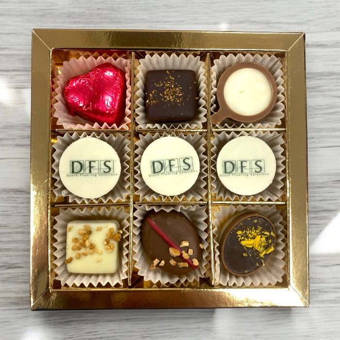 9 luxury bonbons with logo in gold box