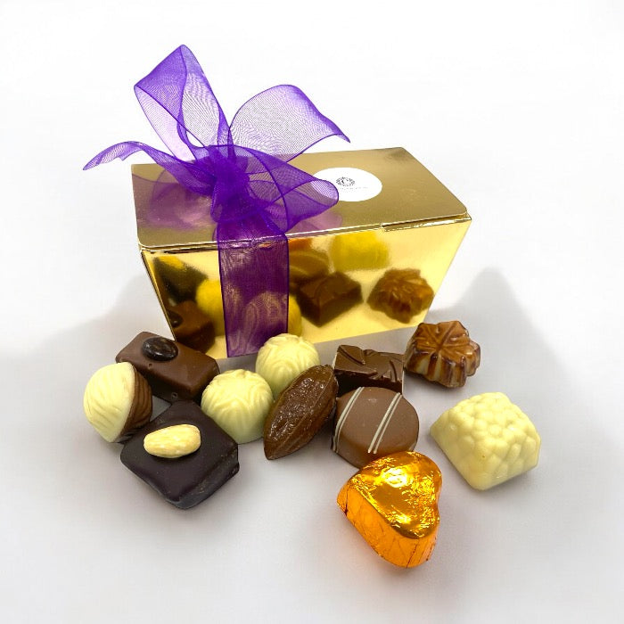 250 grams of Belgian bonbons in a gold box with decoration